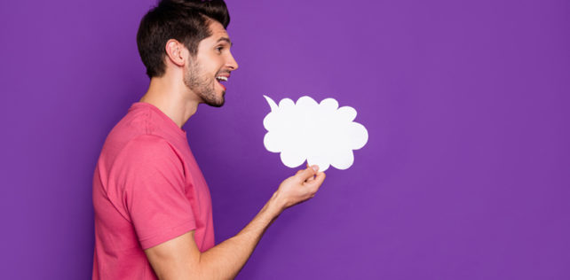 Profile side photo of positive cheerful guy hold white paper card cloud share private confidential advertising secret look good copyspace isolated over vibrant color background; Shutterstock ID 1711806448; ordering_party: CMS LS; job_project: 21_0004_040 / The Economist / Image Concept / IP; purchase_order: Hans Scholten Des propos racistes et sexistes justifient le licenciement d’un salarié protégé