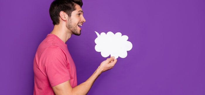 Profile side photo of positive cheerful guy hold white paper card cloud share private confidential advertising secret look good copyspace isolated over vibrant color background; Shutterstock ID 1711806448; ordering_party: CMS LS; job_project: 21_0004_040 / The Economist / Image Concept / IP; purchase_order: Hans Scholten Des propos racistes et sexistes justifient le licenciement d’un salarié protégé