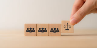 Compliance with employment laws and regulations, labor laws concept. Laws aim to protect workers from discrimination, harassment, unsafe working. Business ethics. La loi élargit l’action de groupe à tous les domaines en droit du travail